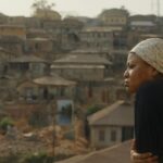 Teniola Aladese Stars in Suspenseful Teaser for “We Must Begin Again, Together”